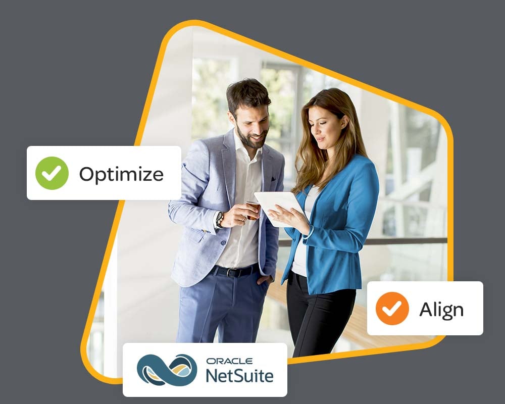 Office workers looking at a tablet together