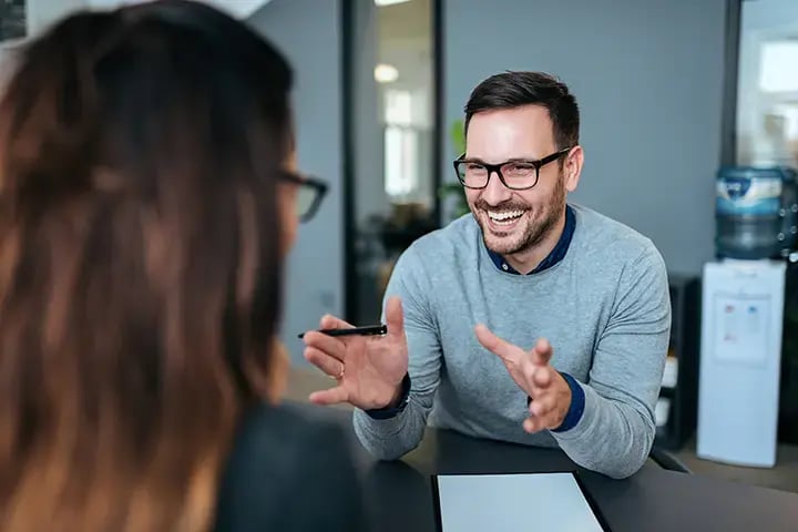 Man explaining something during an office meeting