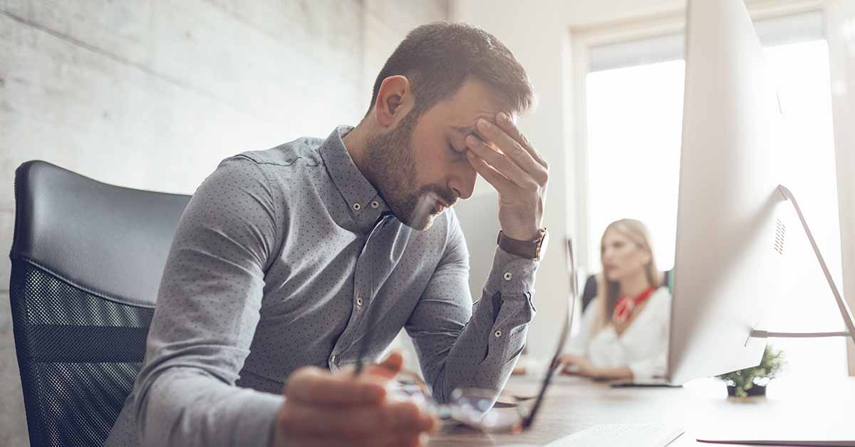 Man frustrated by disparate systems
